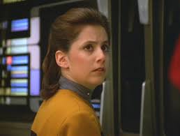 This is cast member Liz Wagner who played Ensign Lia Burke, a Registered  Nurse onboard the Enterprise. She also served as Production Assistant and  2nd Assistant Director. Behind her is Set Costumer