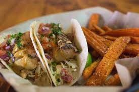 Put the fish and tortillas in the preheated oven for 8 to 10 minutes. Grilled Fish Tacos Wild Alaskan Cod Fillets Corn Cilantro Salsa Cabbage And Pico De Gallo Picture Of Rockaway Bar And Grill Camano Island Tripadvisor