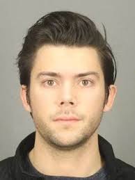 Man charged with secretly filming at tanning salon