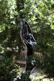 Garden sculpture doesn't have to be bright to work. The Sculpture Garden Musee Rodin