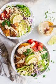 These whole30 fish taco bowls with mango salsa and chipotle aioli make an absolutely wonderful whole30 dinner. This Recipe For Paleo Fish Taco Bowls Will Leave You Wanting More Healthy Whole30 Fish Taco Bow Whole30 Dinner Recipes Summer Seafood Recipes Paleo Fish Tacos