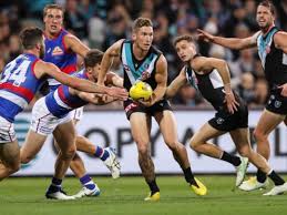 Bulldogs onslaught continues with goals and points coming freely as the bombers were stunned. Bulldogs Port Clash To Open Last Afl Round 7news