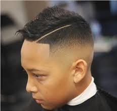 Boys fade haircuts keep the sides clean, short and simple, while a hard side part adds a classy yet cool hairstyle on top. 60 Little Black Boy Haircuts For Curly Hairs 2021 Mrkidshaircuts Com