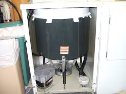 The motor sits on a roller and spring track, the belt is a cloth/rubber belt. Maytag Dependable Care Washers Extinct