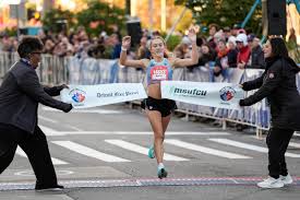 Detroit marathon marked by touching embrace, tragic collapse
