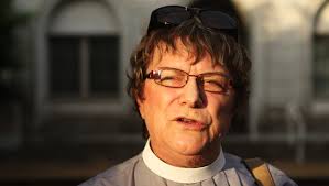 Activists honor Charlottesville dead, vow 'Hate doesn't win' at vigil