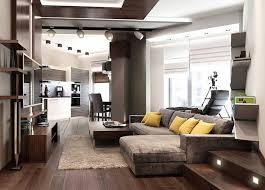A minimalist masculine living room with a dark wall and sofa, a hex coffee table and lights. 20 Elegant Masculine Interior Design Ideas