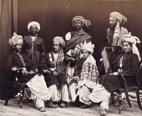 Four sons of the Khan of Lalpura (Mohmand Pashtuns) with attendants, Afghanistan,1878. Photo by John Burke.