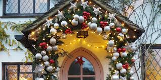 Love the look of old arced windows? How To Create An Instagrammable Front Door Display For Christmas