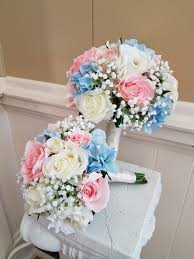 Maybe you would like to learn more about one of these? Silk Flower Bouquets Soft Blush Pink And Cream Roses A Touch Of Light Blue Hydrangeas Nestle Bridal Bouquet Pink Blush Pink Wedding Flowers Light Pink Wedding