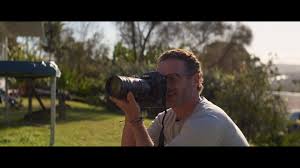 Penguin bloom when an unlikely ally enters the bloom family's world in the form of an injured baby magpie they name penguin, the bird's arrival makes a profound difference in the 2020 132m movie. Nikon Camera Of Andrew Lincoln As Cameron Bloom In Penguin Bloom 2020