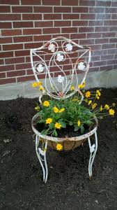 Pin By Carol Brown On Outdoor Living Chair Planter Garden Chairs Design Old Metal Chairs