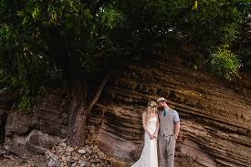 Not only does tulum have beaches with vibrant turquoise water but unlike other resort towns, there are so many beautiful backgrounds for photos, from the mayan ruins to the dramatic cliffs. Amy And Wade S Romantic Destination Wedding In Antigua
