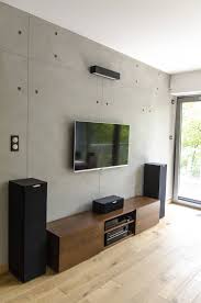 Industrial Style Living Room With Concrete Wall Panels By Pracownia A Industrial Style Living Room Concrete Wall Panels Room Design