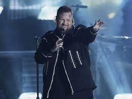 Jelly Roll, country music star, fights through song after seeing emotional  young fan's sign - al.com