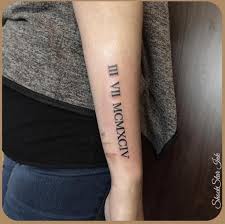 Check out these 15 mathematical number tattoos for ideas and inspiration: Roman Numeral Tattoo Designs Men