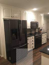 Looking for more furniture makeovers ideas? 12 Beautiful Laminate Counter Top Ideas Black Appliances Kitchen Appliances White Cabinets White Cabinets Black Appliances