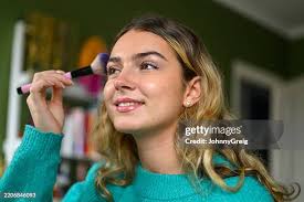 9,870 Woman Applying Lipstick Stock Photos, High-Res Pictures, and Images