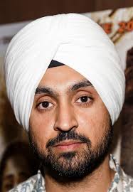 Diljit was seen wearing an achkan and pajama, along with a turban and a  floor-length cape that featured the map of Punjab in gold embroidery and  the mool mantra written in Gurmukhi