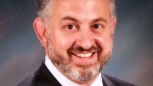 Commissioners order immediate closing of disputed account in public  defender's office