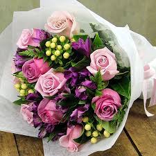 Fresh flowers delivered daily, order before 1:00pm to avoid disappointment. Purple Posy With Free Candle Sydney Only