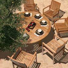 Get The Look Throw The Most Stylish Outdoor Dinner Party Find The Best In Luxury Outdoor Seating And Dini Outdoor Dining Set Outdoor Tables Teak Garden Bench