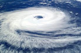 Cyclone, any large system of winds that circulates about a centre of low atmospheric pressure in a counterclockwise direction north of the equator and in a clockwise direction to the south. Cyclone Meteorology Britannica