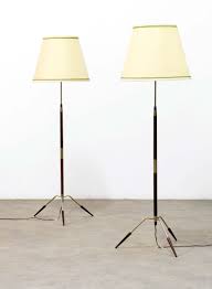 Check spelling or type a new query. Svend Aage Holm Sorensen A Black And Red Lacquered Metal Table Wall Lamp With Brass Fittings And Pierced Shade Mutualart