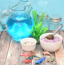 Leave the neck of the jar as you want that to be covered with yellow sand. Light Up Mason Jar Aquariums The Tiptoe Fairy