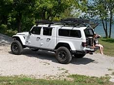 Smart storage solutions are found throughout the 2020 gladiator, including durable mesh pockets that extend the entire length of the doors and numerous phone storage areas. Cx Classic Truck Cap Gallery A R E Truck Caps And Tonneau Covers