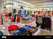 SINGAPORE - CIRCA APRIL, 2019: clothes on display at Guess the ...