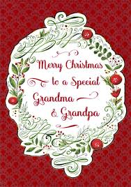 Merry christmas grandma floral wreath with gold coffee mug. Oval Frame Green Plants Vines And Red Flowers Burgundy Border Grandma And Grandpa Christmas Card From Adult By Designer Greetings