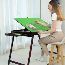 Simply unfold it to reveal a center work area measuring 30 inches by 22 inches. Wooden Portable Jigsaw Puzzle Table With Storage Two Drawers Folding Tilting Table For Puzzle Games 1500 Pieces Puzzles Green Buy Online In Dominica At Dominica Desertcart Com Productid 199778999