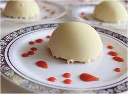 White Chocolate Half Spheres Filled With Strawberry Mousse And Served With Strawberry Coulis Dessert Recipes Fancy Desserts Desserts