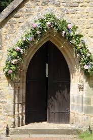 English Church Portal Decorated For A Wedding Church Wedding Flowers Church Entrance Church Wedding Decorations