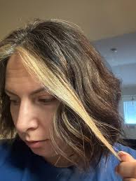 Who can touch up blonde hair roots?