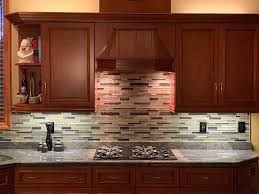 Tuscan kitchen with tile mural backsplash. Kitchen Renovations Chris Bradley Landscape Group
