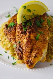 If you want to give it more flavor, add some cilantro and lime juice to it. Blackened Catfish Over Cajun Rice Recipe Kitchen Swagger