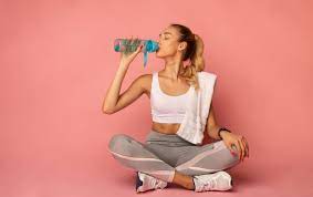 Maybe you would like to learn more about one of these? Fitness Woman Drinking Water Sitting On Floor In Studio Elite Care 24 Hour Emergency Room
