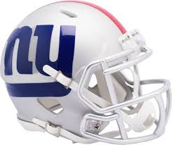 Large action photo of new york football giants vs. Riddell New York Giants Amp Speed Mini Football Helmet Dick S Sporting Goods