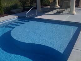 A Tanning Ledge In A Pool Designed And Built By Caribbean Pools Www Caribbeanpools Com Tanning Ledge Pool Vinyl Pools Inground Pool Tanning