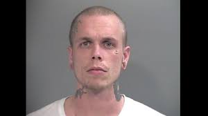 Woman Shot In Home Invasion Arrested