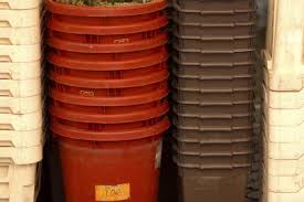 In a big, open space, lay out your burlap. How To Make A Planter Out Of A Bucket