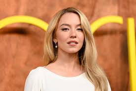 Sydney Sweeney Pairs Her Plunging Brown Corset With a Cowgirl-Coded Styling Trick