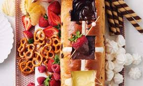 Edible flowers aren't a new phenomenon, but garnishes of fresh flowers tend to intimidate diners. Woolworths Australia Share Easter Recipe For A Triple Chocolate Hot Cross Fondue Platter Daily Mail Online