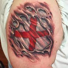 Some people us this as a way of self manifestation. St George Flag Tattoo Best Tattoo Ideas Gallery Ripped Skin Tattoo Flag Tattoo Tattoos