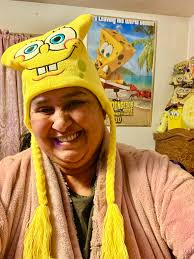 if anyone finds this bucket hat plz lmk😭 and also my rainbow spongebob fan.