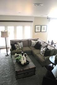 Because cocktail tables are generally taller than coffee tables and end tables, consider arranging the sectional sofa in the corner of the room and placing the cocktail table behind the center of the sofa. Gray And White Color Palette Sectional Sofa Love The Coffee Table Chaise Sofa Living Room Small Living Rooms Sofa Decor