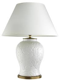 The table lamp base is topped by a crisp white linen shade. Casa Padrino Luxury Ceramic Table Lamp White Antique Brass Living Room Furniture