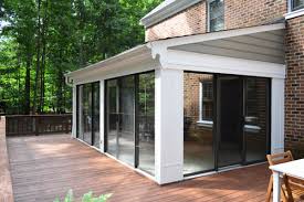The main costs incurred when converting a porch into a sunroom will be with the windows. Open Er Up Converting A Sunroom Into A Veranda Young House Love